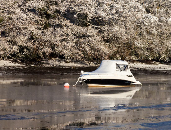 snow covered boat